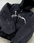 Dunkelbraune, scharfe Jacke