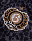 Langarmtrikot mit schwarzen Tiermotiven