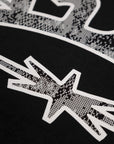 T-Shirt mit schwarzen Tieren