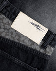 Schwarze Jeans-Shorts mit Leopardenmuster und Taschen