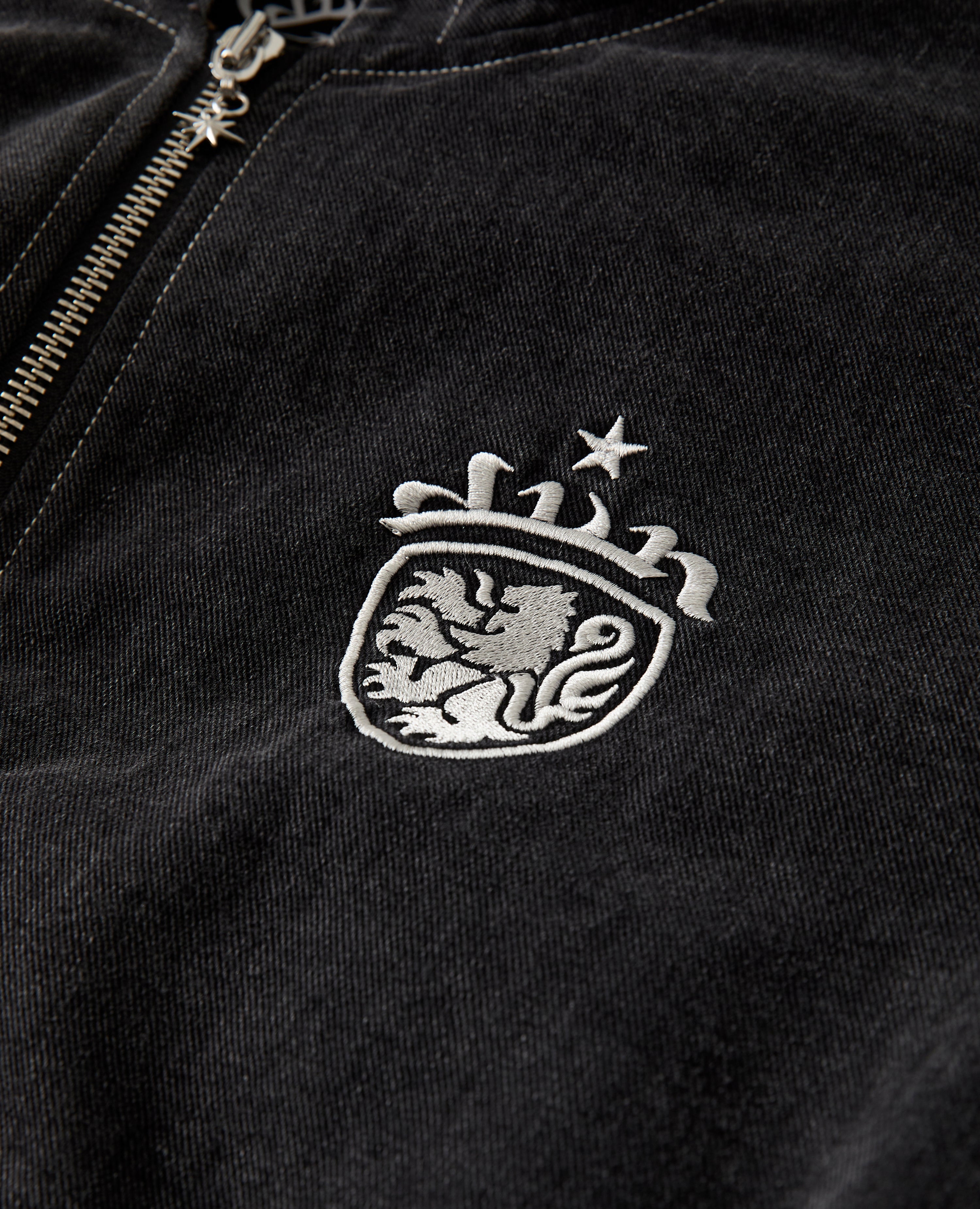SCHWARZE WAPPENJACKE