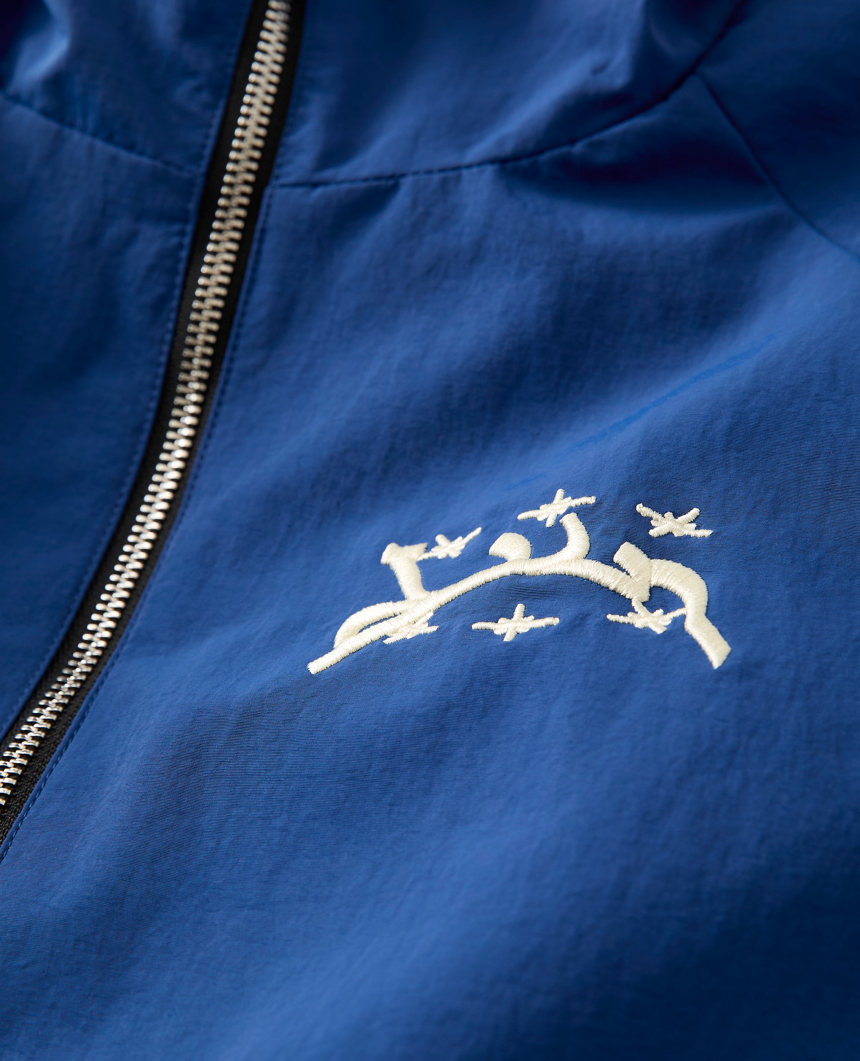 Dunkelblaue Windbretjacke