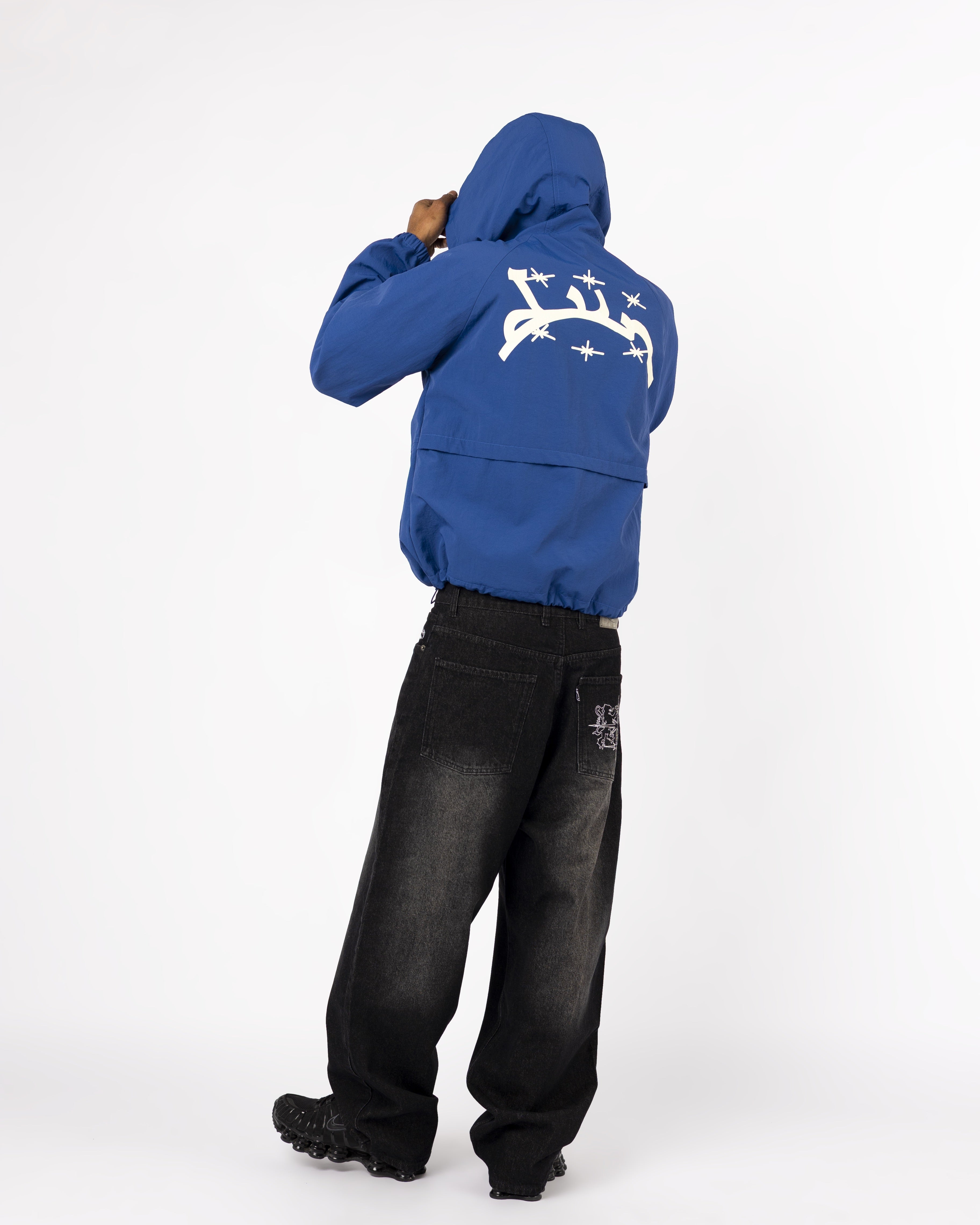 Dunkelblaue Windbretjacke