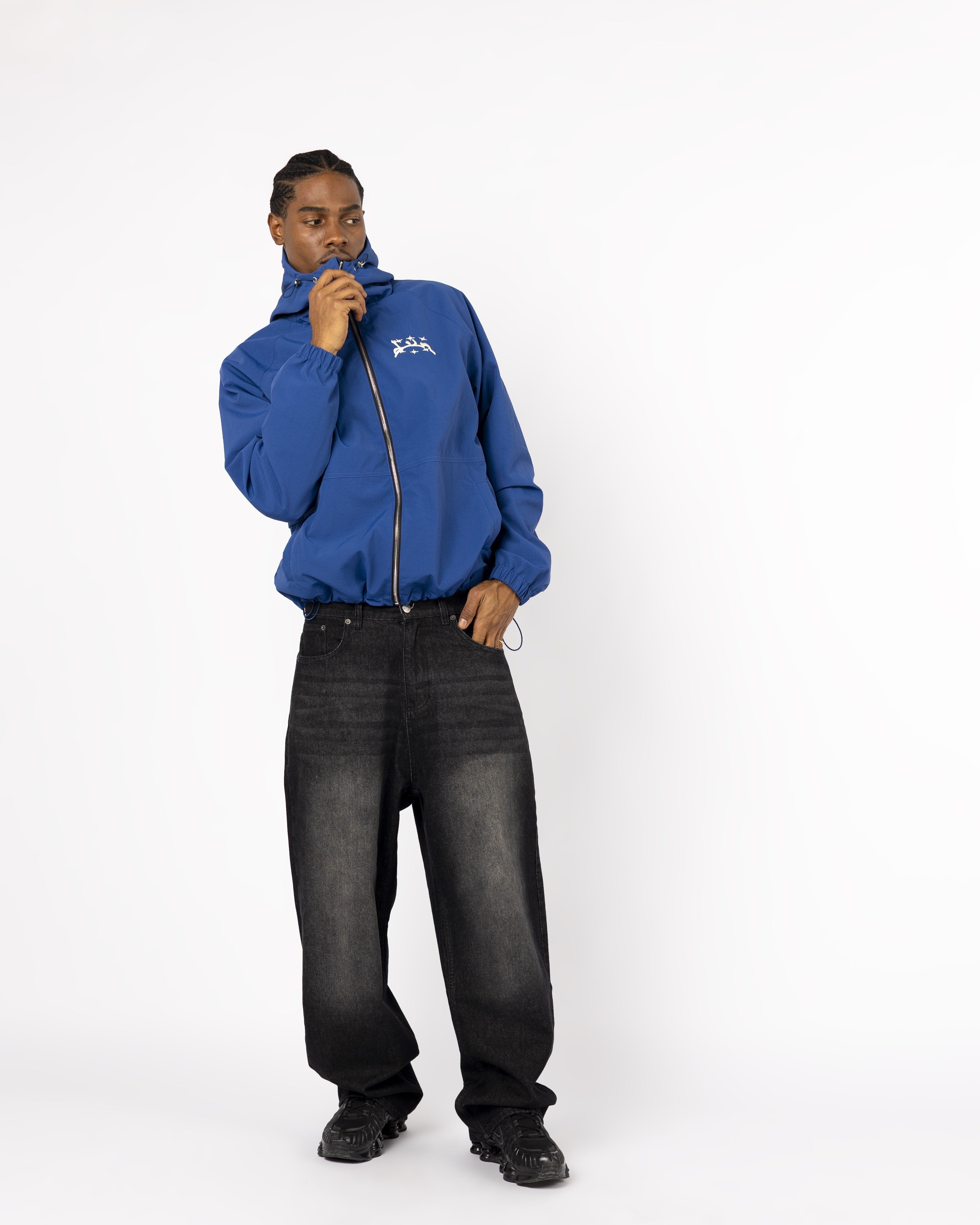 Dunkelblaue Windbretjacke