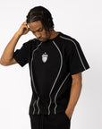 TECH-T-SHIRT MIT SCHWARZEM WAPPEN