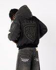 SCHWARZE WAPPENJACKE