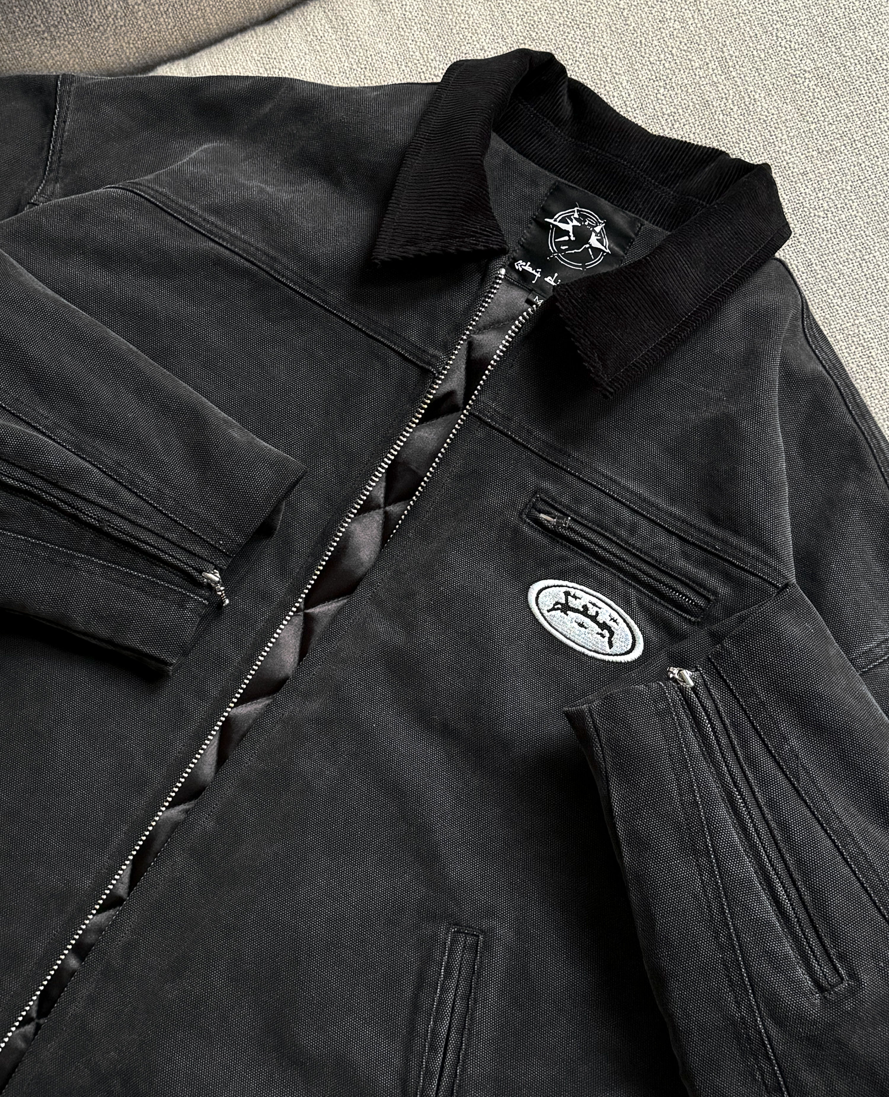 SCHWARZE ARBEITSJACKE AUS CANVAS